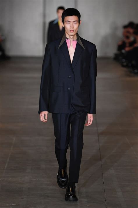 prada corso como|Prada Went Back to Its Minimalist Roots for Fall 2023 Menswear.